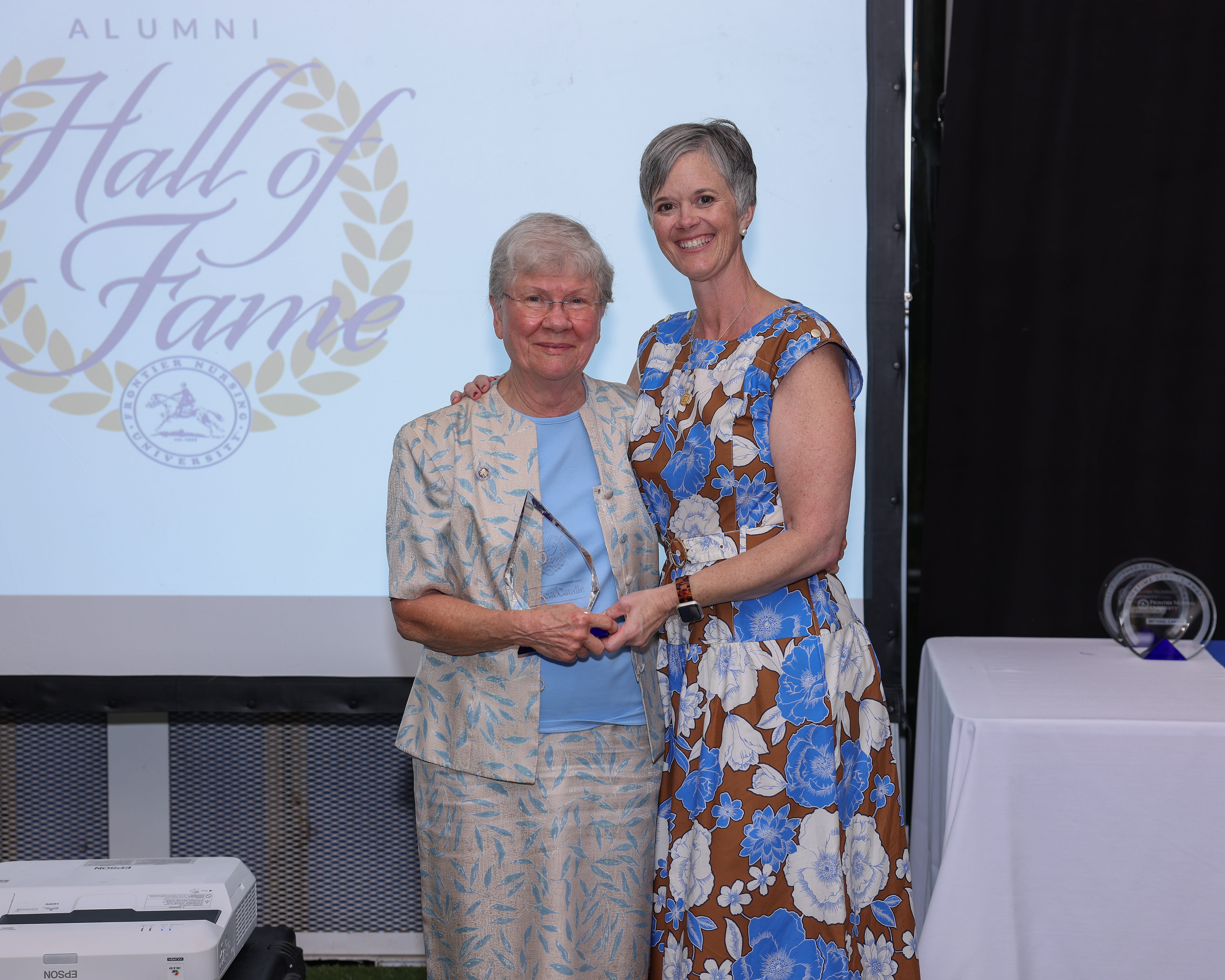 Pat Caudle accepting her induction into the FNU Hall of Fame
