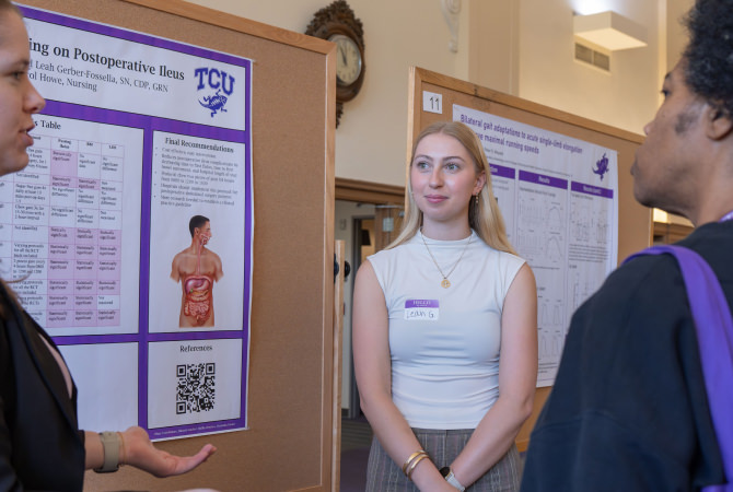 Student presenting research at the Harris Annual Research Conference